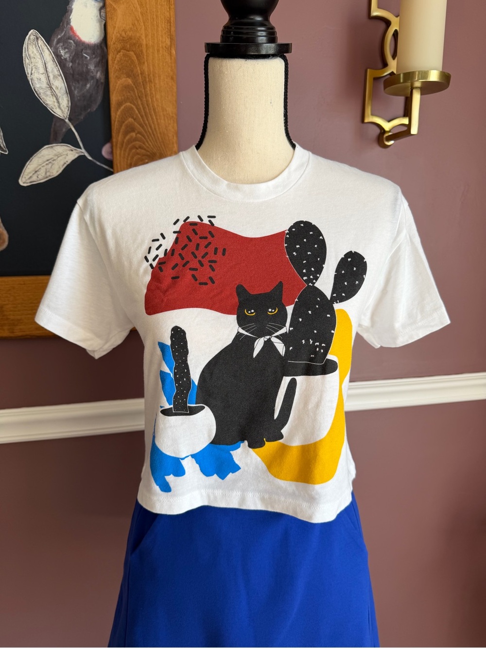 Obsidiopolis XS White Graphic Cat Tee with Bold Color Blocks Meow Wolf Denver